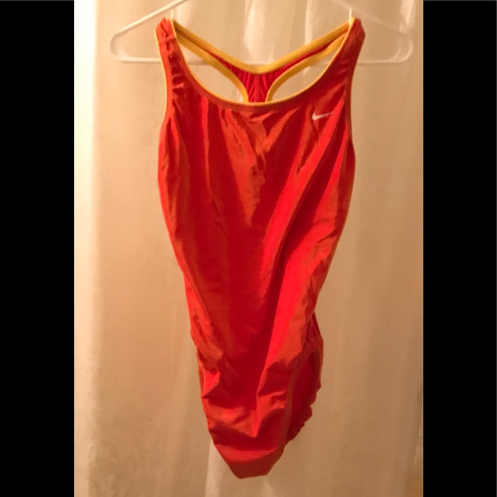 Nike swimsuit in blood orange with yellow border.
